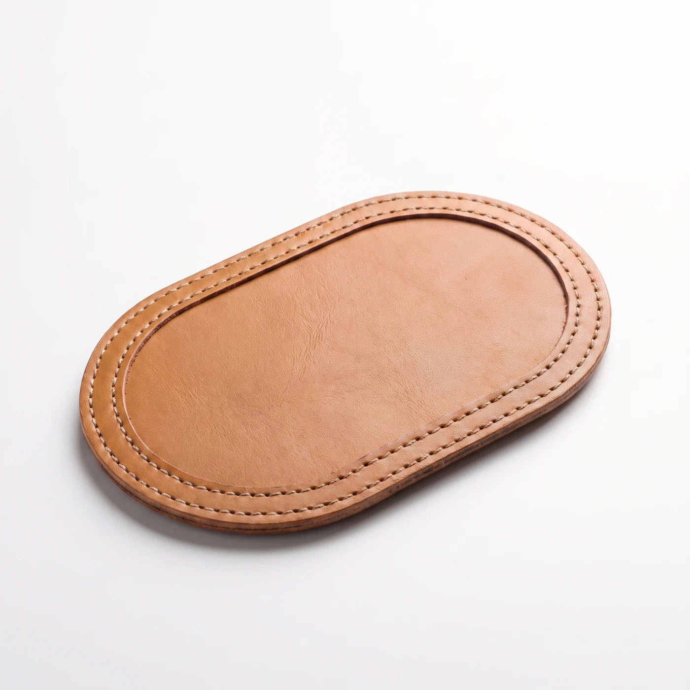 The caramel leather side of the strop